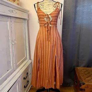 Rust and white pin stripes, cotton, slits in front, sexy tie closure’s on bust.